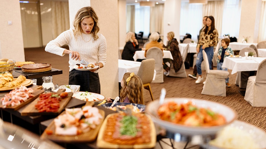 woman-getting-breakfast-buffet-hotel.jpg