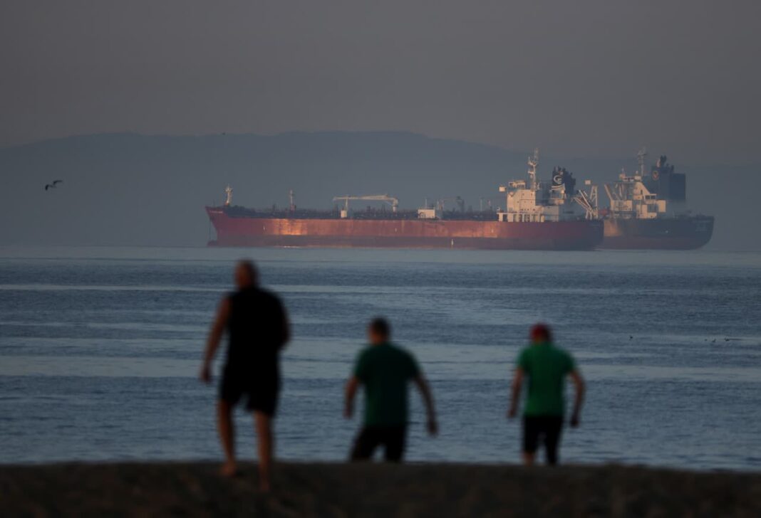 Oil Prices Slide Below $100 as Iran Deal Hopes Ease Supply Fears