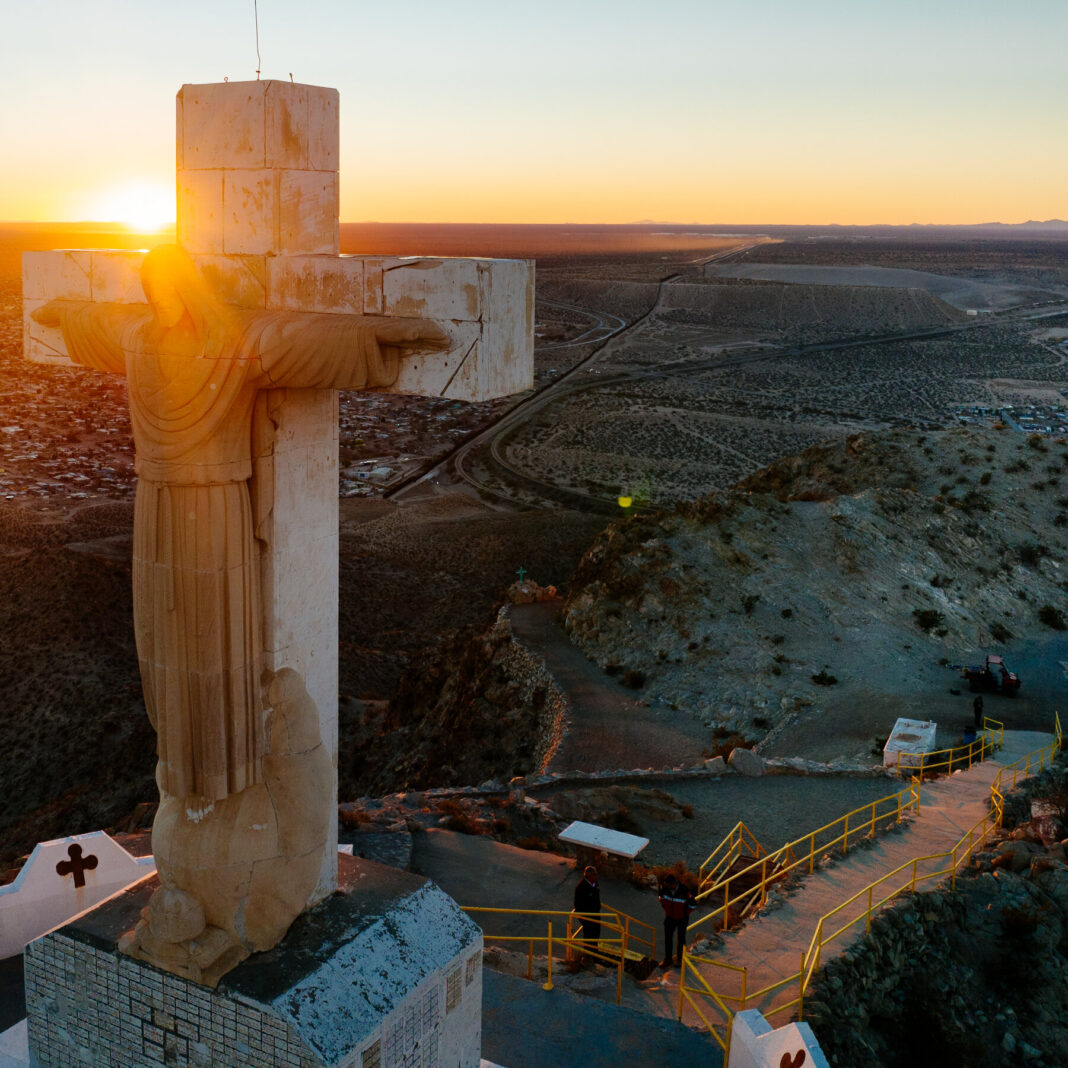 Diocese Sues to Stop Border Wall Seizure at Holy Site Beneath Christ of the Mountains Statue