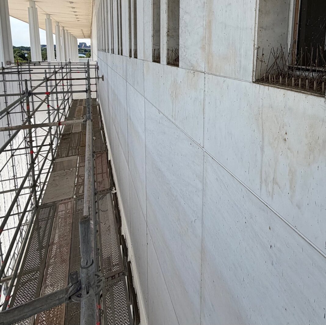 Photos Behind Kennedy Center Tarps Reveal Empty Marble Where Trump’s Name Once Was