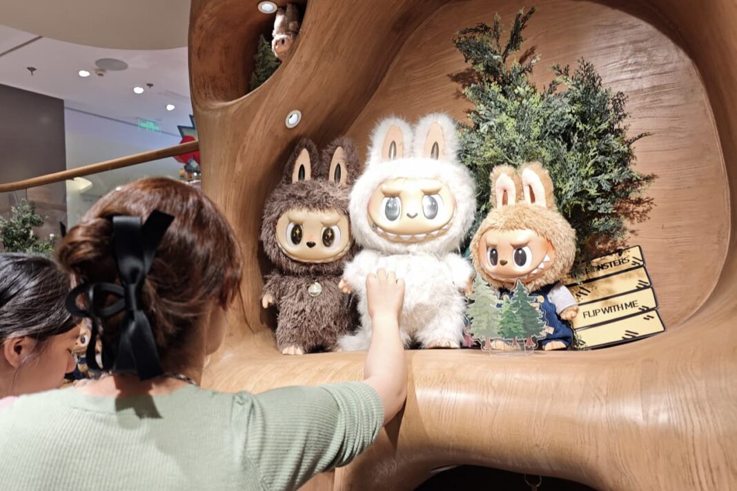 China’s economy finds an odd new anchor: toy elves and robot cops as symbols of a fractured financial landscape