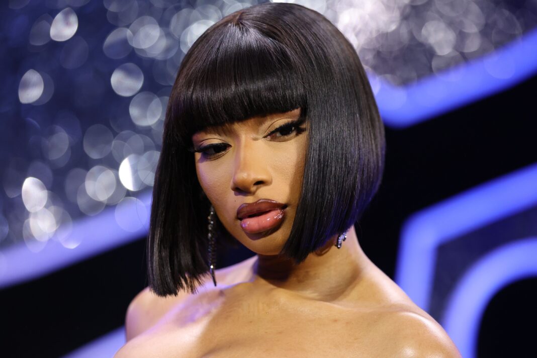 Megan Thee Stallion Debuts Neon Green Hair That’s Impossible to Miss—Watch the Transformation